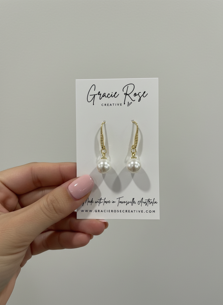 The Heiress Pearl earrings by Gracie Rose Creative displayed on a card, featuring handmade pearl drop design, perfect for gifting or personal wear.