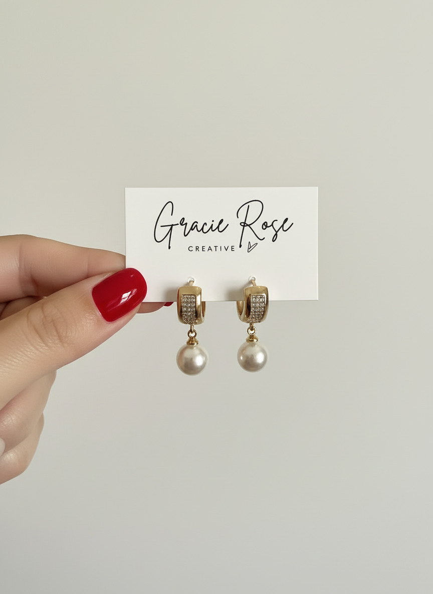 Elegant Hidden love Huggies earrings showcased on a clean background highlighting their classic design.