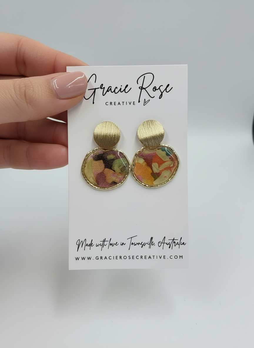 Golden Bloom Mini Studs worn by a model, highlighting their lightweight and versatile style.