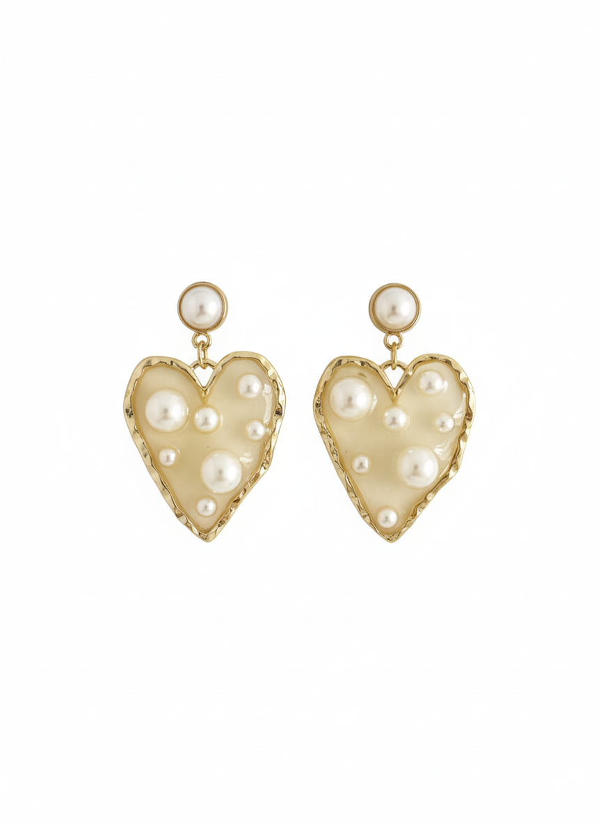 Opulent Hearts gold-toned heart earrings with pearl details, presented on a clean white background for an elegant look.