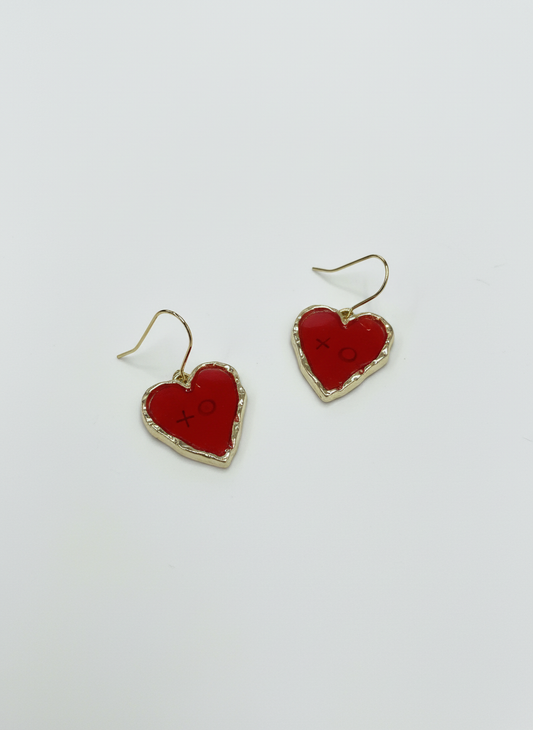 Mini XOXO in red heart-shaped earrings framed in gold tones by Gracie Rose Creative, showcasing their handmade charm.