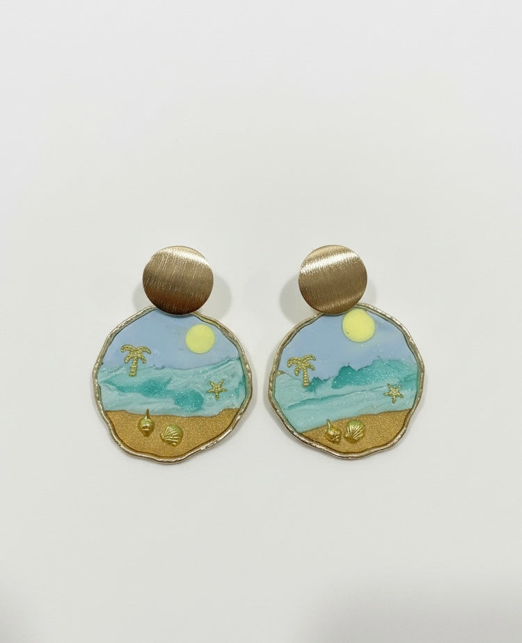 Handmade Beach Day Bliss earrings by Gracie Rose Creative featuring a coastal scene with golden sands and blue ocean hues.