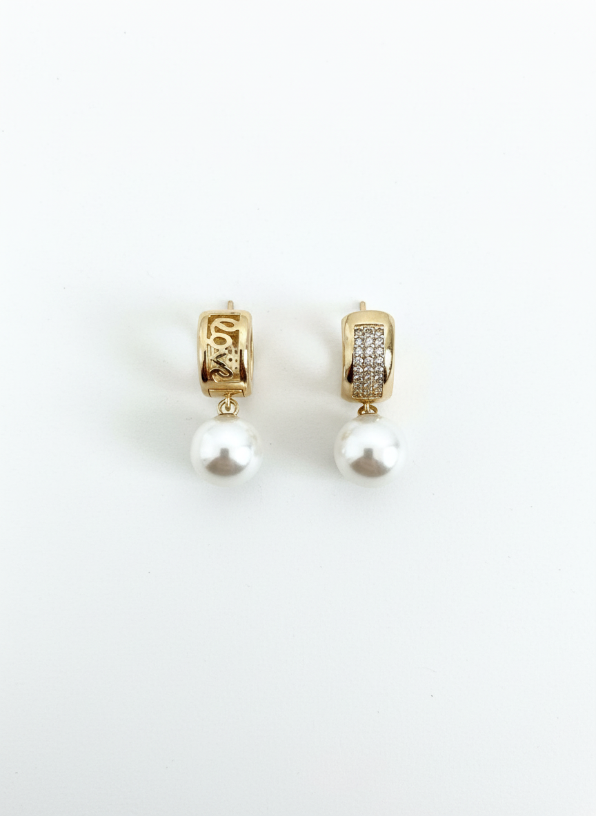Close-up of Hidden love Huggies earrings showing the hidden love cut-out detail.