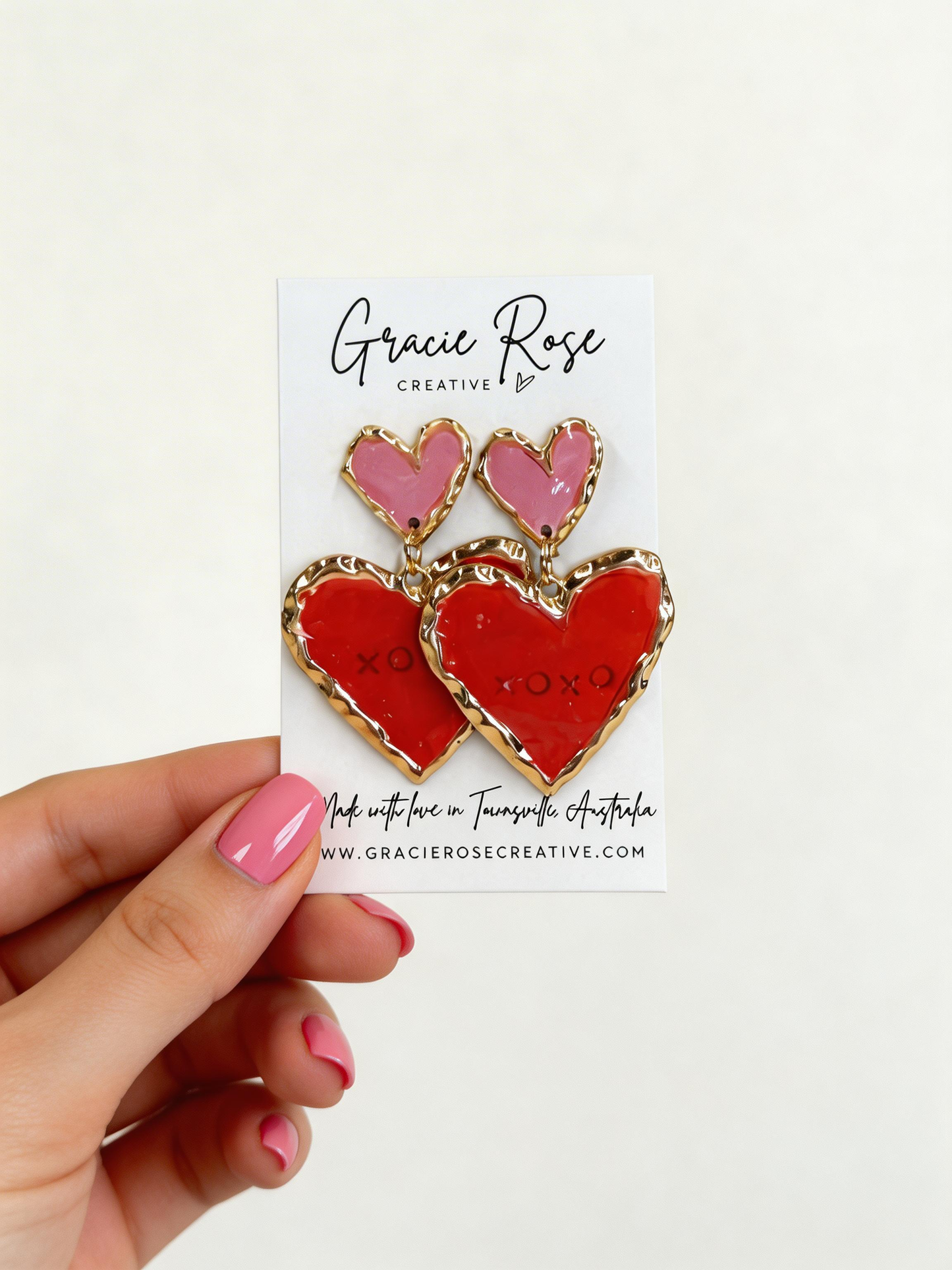 Bold and lightweight Double Sweetheart in Pink & Red statement earrings handcrafted from polymer clay, ideal for date nights and celebrations.
