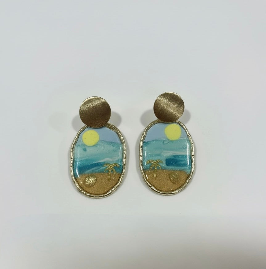 Handmade polymer clay earrings titled 'Hello Sunshine' by Gracie Rose Creative, featuring a tropical design with palm trees, blue waves, and a golden sun.