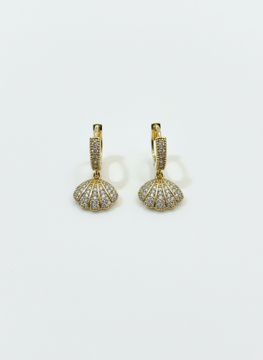 Gilded Seashells - Golden shell huggies earrings with shimmering stones, showcasing coastal elegance.