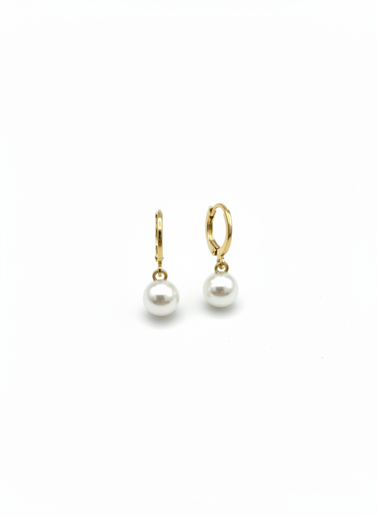 Showcasing the Classic Pearl Huggies by Gracie Rose Creative, this image features elegant gold earrings with dainty pearls, perfect for everyday chic jewelry or special occasions. Ideal as bridal earrings or a unique gift for her, these lightweight dangle earrings exude timeless elegance and modern style.