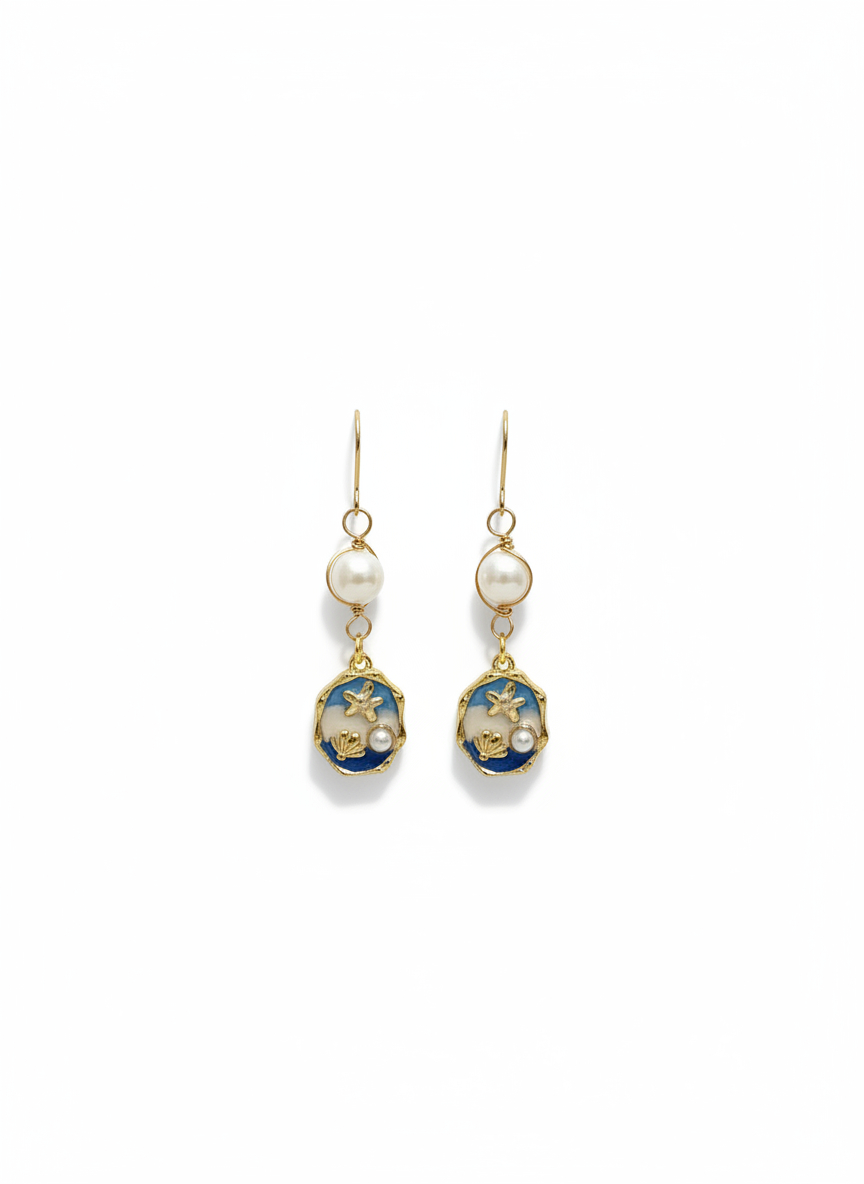 Elegant Siren Pearl drops earrings featuring a mix of pearls and ocean-inspired blues, handmade by Gracie Rose Creative.