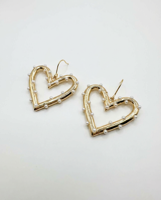 Luxe Heart Hoops earrings by Gracie Rose Creative featuring a shimmering gold heart design adorned with delicate pearls.