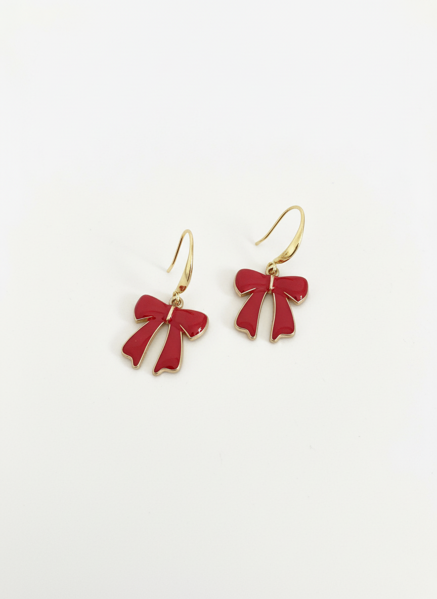 Handmade Cherry Bow Dangles earrings by Gracie Rose Creative. Classic red bows with soft gold hooks, perfect for adding a playful touch to any outfit.