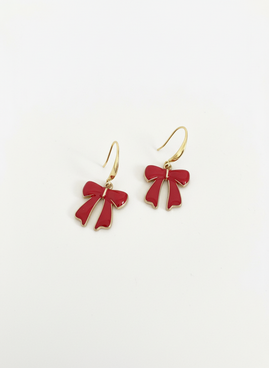 Handmade Cherry Bow Dangles earrings by Gracie Rose Creative. Classic red bows with soft gold hooks, perfect for adding a playful touch to any outfit.