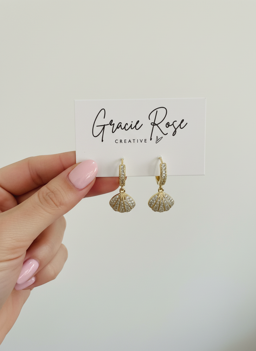 Gilded Seashells - Handmade golden huggie earrings, perfect for a chic coastal look.