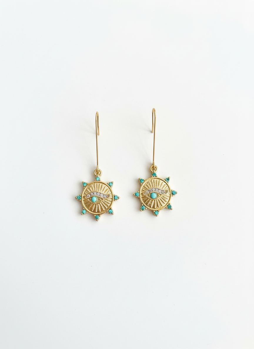 Elegant Solar Guardian Drops earrings by Gracie Rose Creative featuring a radiant sunburst design with turquoise-inspired accents.