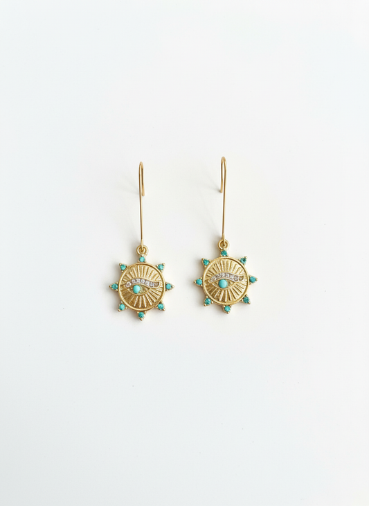 Elegant Solar Guardian Drops earrings by Gracie Rose Creative featuring a radiant sunburst design with turquoise-inspired accents.