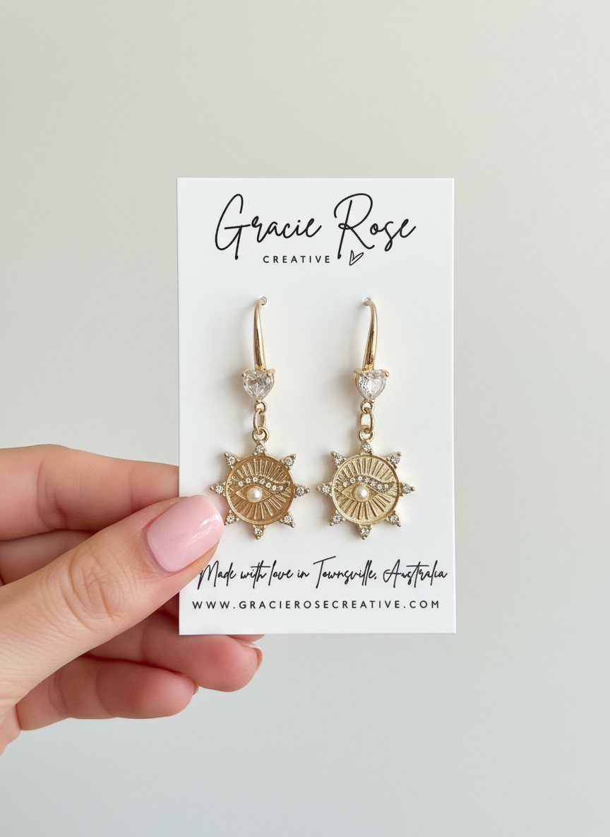 Stylish presentation of Eternal Love Evil Eye Drop Earrings in a hand-crafted display, highlighting their spiritual significance.