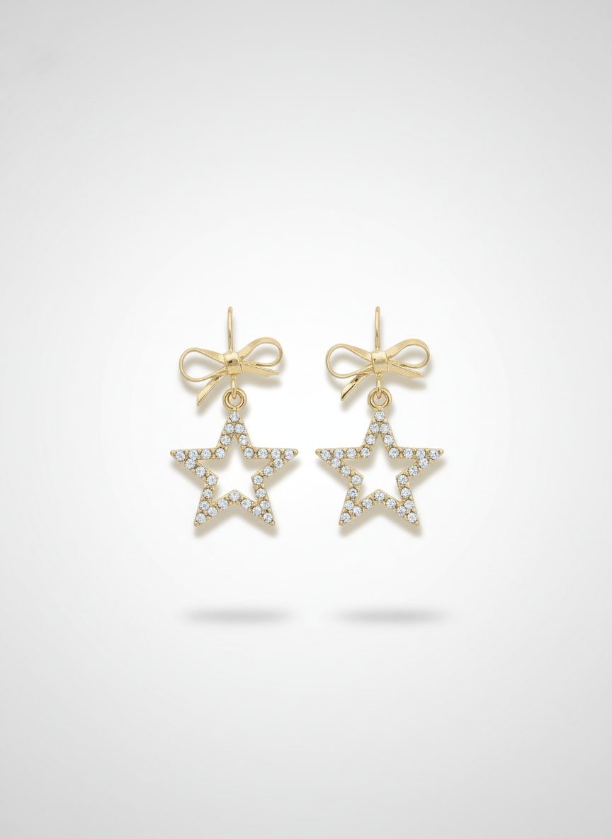 Starlight Baubles earrings by Gracie Rose Creative featuring gold plated star design adorned with diamantés and delicate bows.