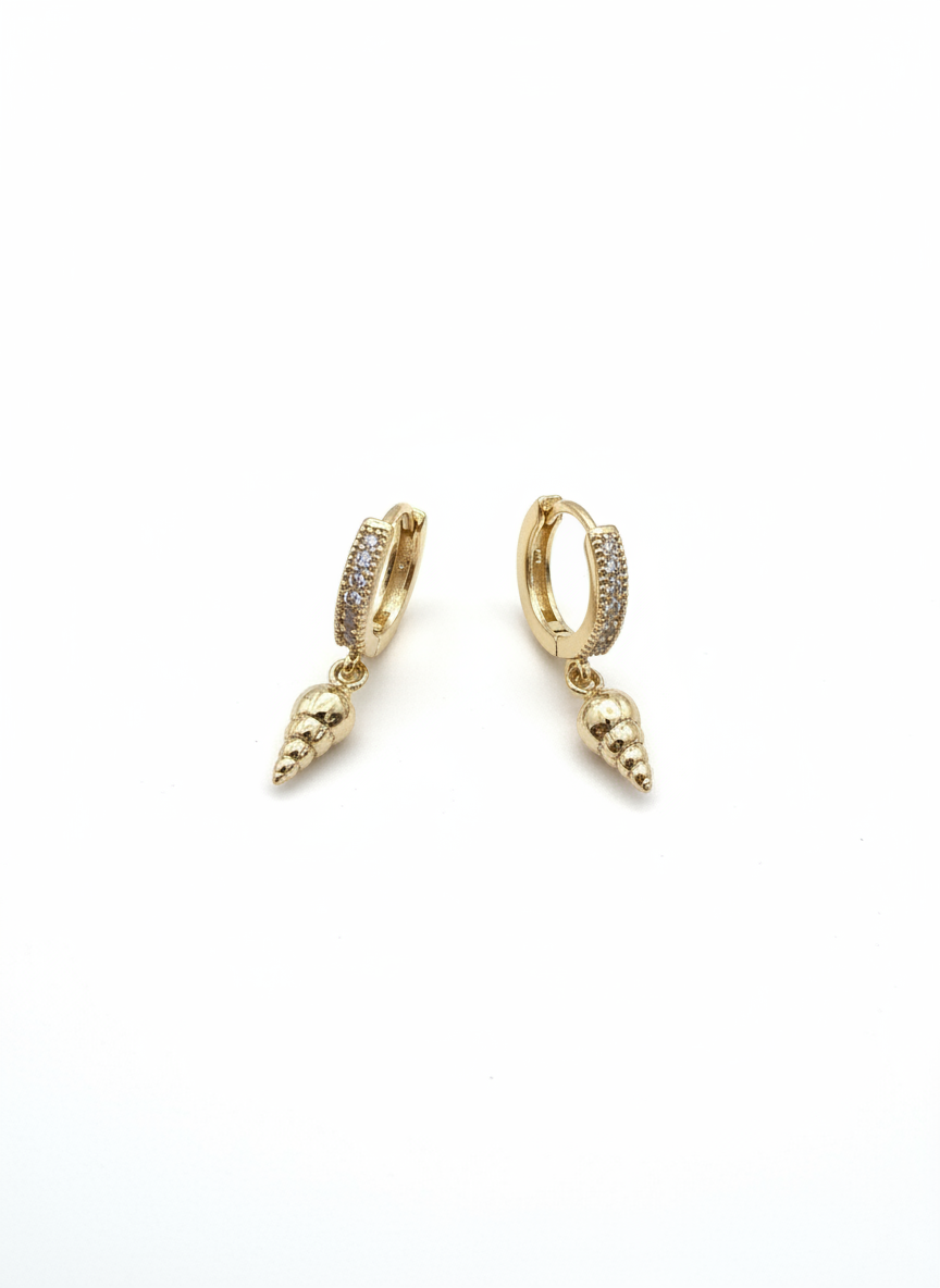 Close-up of Beach Babe Huggies by Gracie Rose Creative, showcasing classic gold huggie earrings with pavé crystals and charming shell drops.