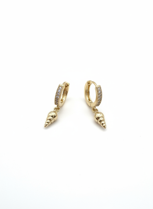 Close-up of Beach Babe Huggies by Gracie Rose Creative, showcasing classic gold huggie earrings with pavé crystals and charming shell drops.