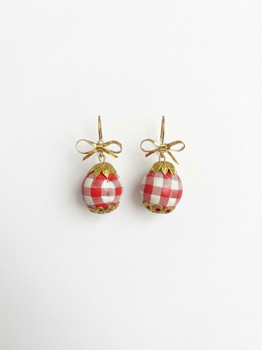 Gingham Baubles red drop earrings by Gracie Rose Creative showcasing a charming vintage style with gold bows.