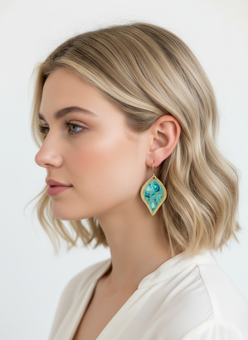 Sage Mosaic Drops by Gracie Rose Creative - Model wearing elegant turquoise mosaic earrings with a gold leaf frame, showcasing a stylish look.