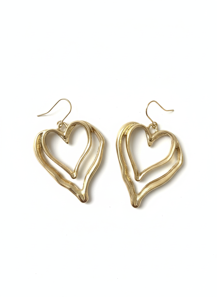 Double Heart Glow Drops earrings featuring a romantic and modern double-heart design, gold-plated with beautiful diamanté accents.