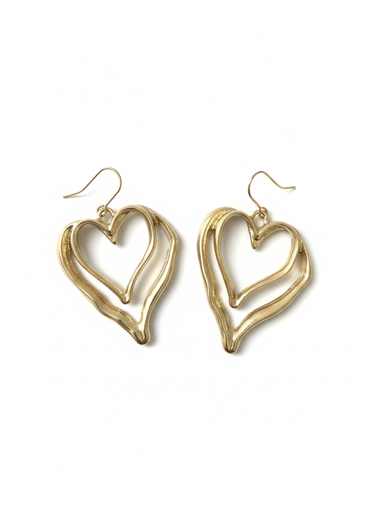Double Heart Glow Drops earrings featuring a romantic and modern double-heart design, gold-plated with beautiful diamanté accents.